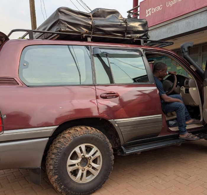 v8 with a roof top tent